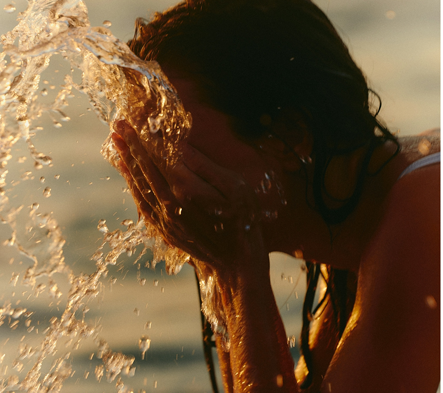 Splashing face with water